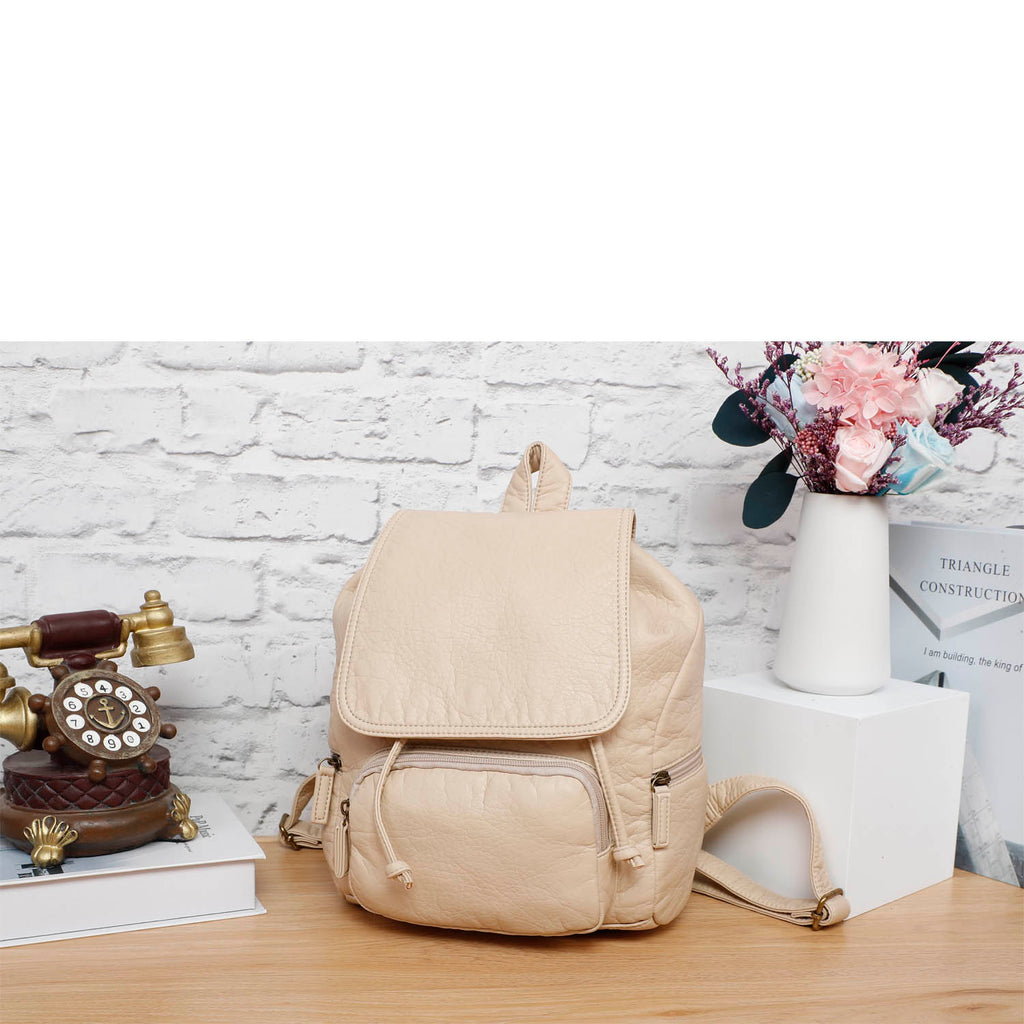 Taupe backpack on sale purse